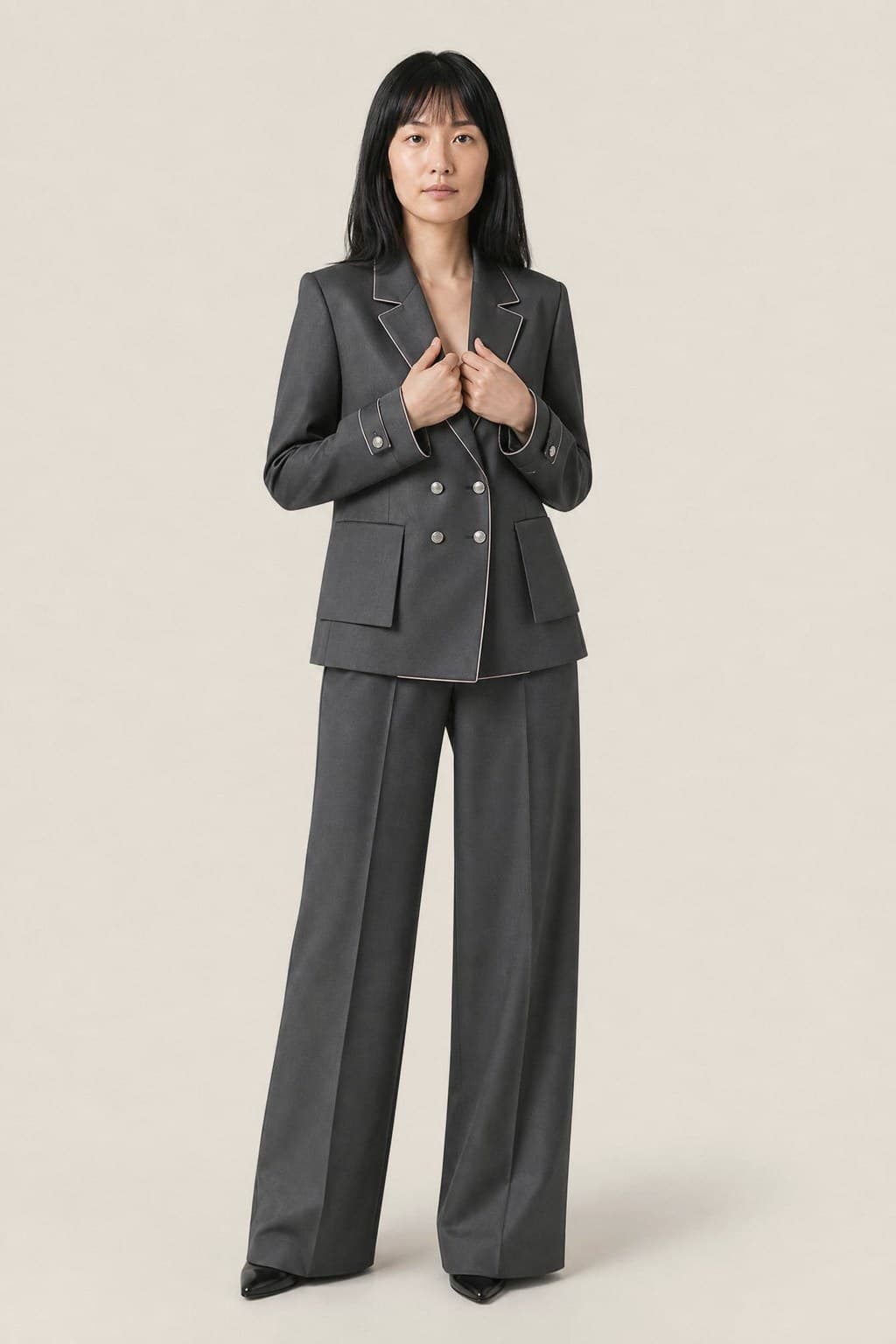 The Suit, Reconsidered: One Look, Two Lives